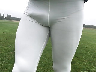 All'aperto Walking in a public park in white leggings.