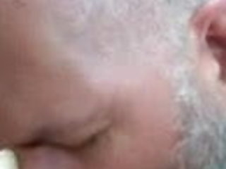 In the car in the parking lot of the shopping center