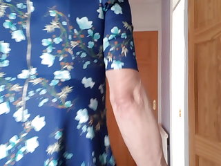 Kazzie in dress in bedroom