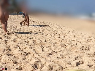 Bikiny Showing my Plugged Ass and pissing on a public beach